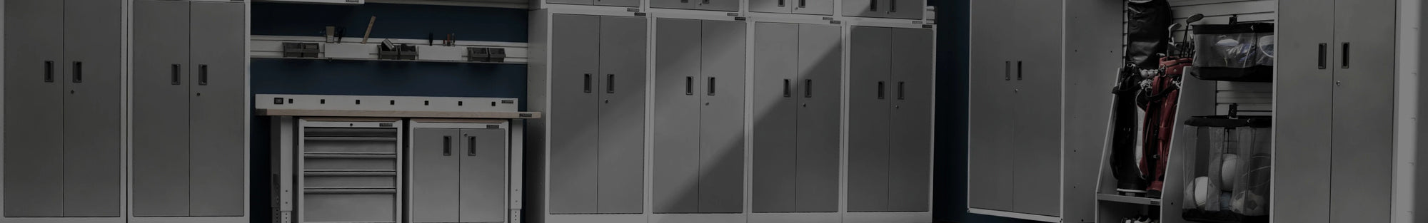 Full size garage storage cabinets in a garage.