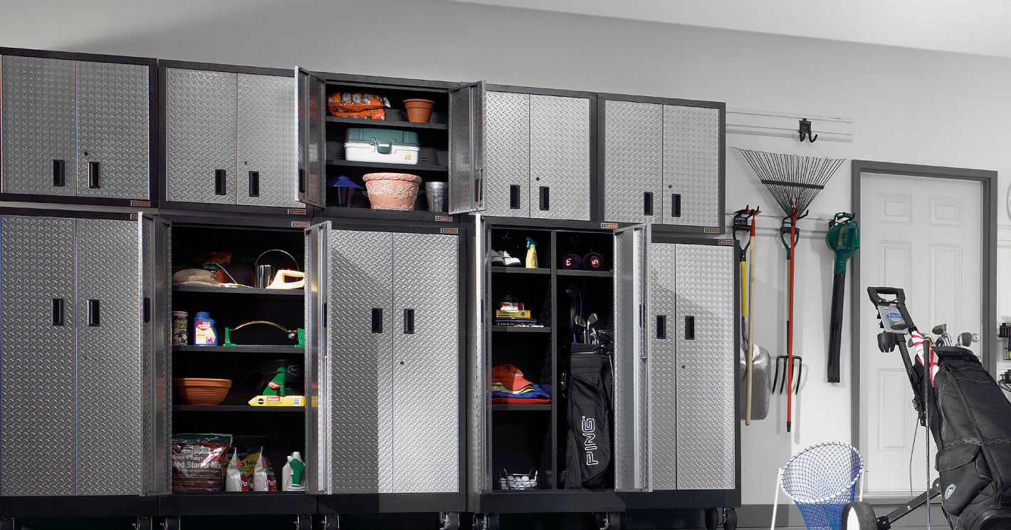A garage stocked with cabinets.