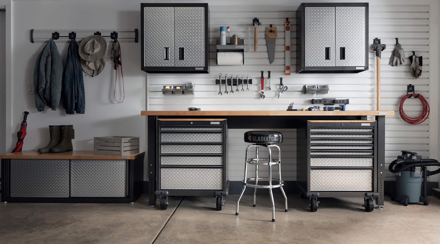 A wall of a garage filled with Gladiator® storage solutions and products