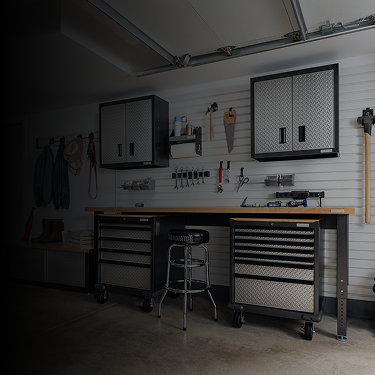 An organized garage full of Gladiator® storage solutions